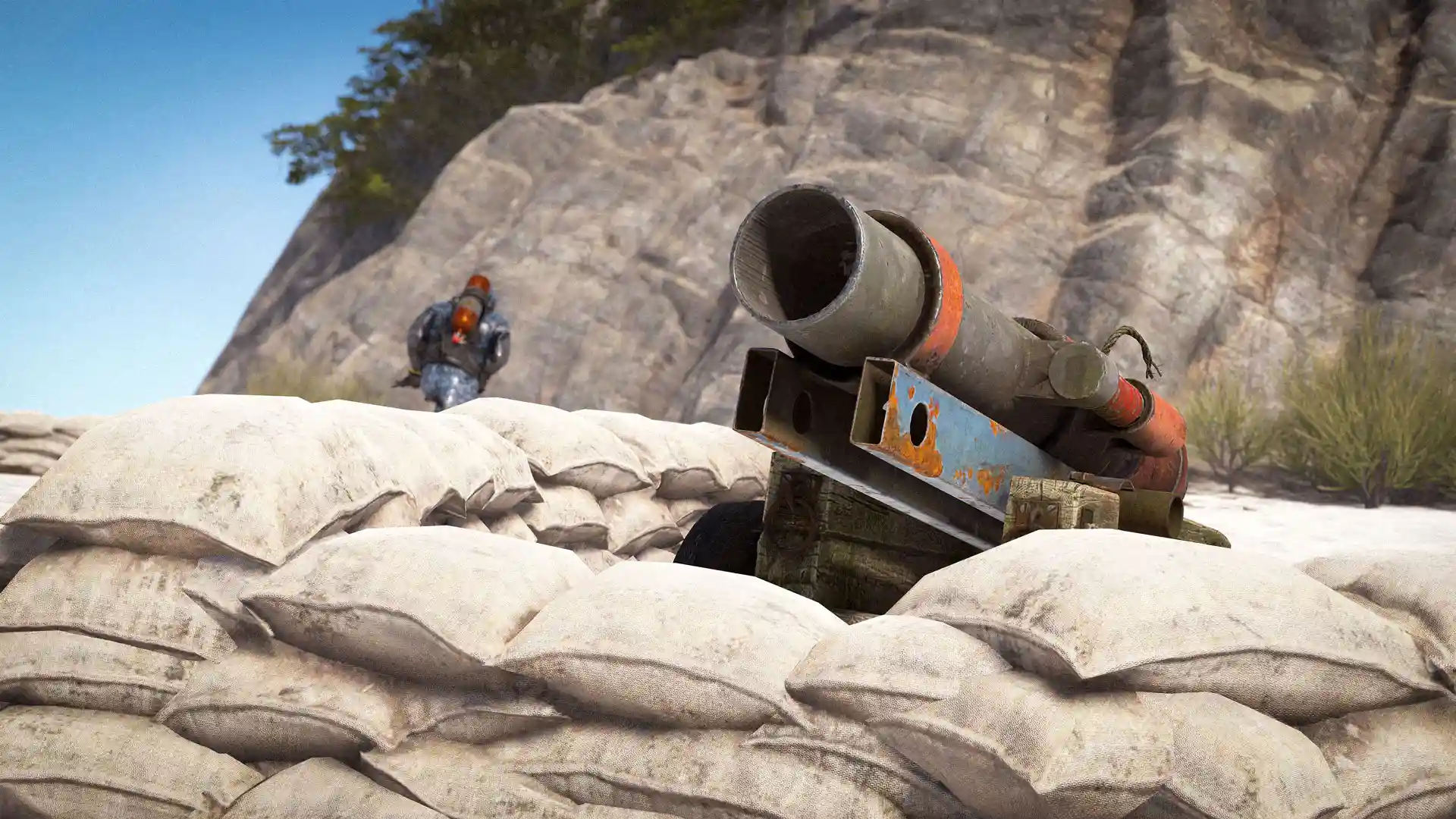 Rust mounted cannon on tropical island