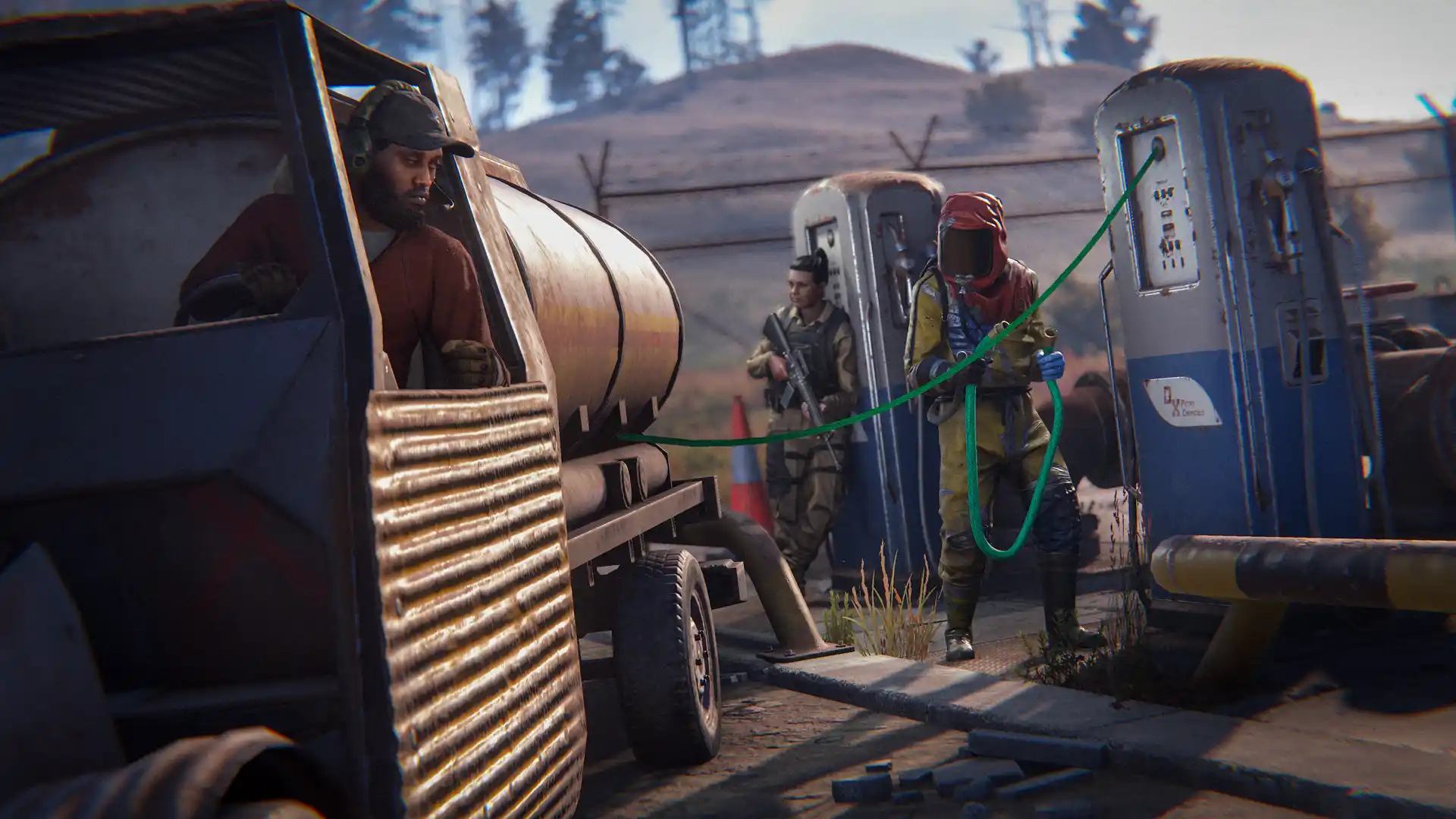 3 Rust players pumping crude oil from dome into a tanker module vehicle.