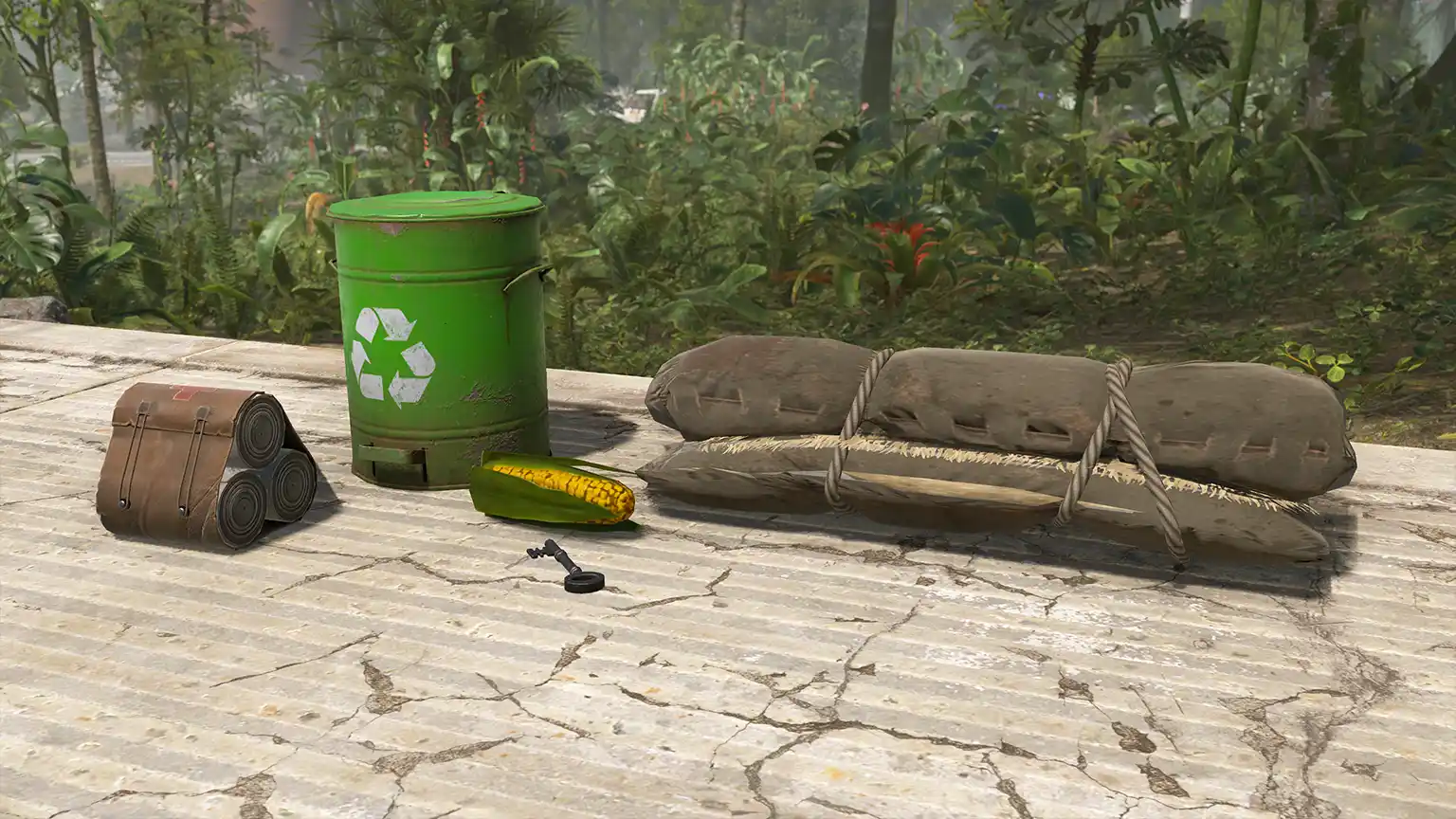 Rust models of a sleeping bag, recycling workbench module, corn, keys and bandages